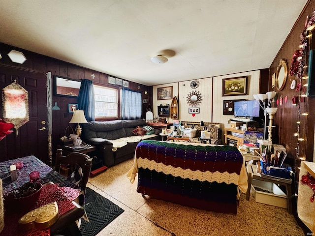 living room featuring wooden walls