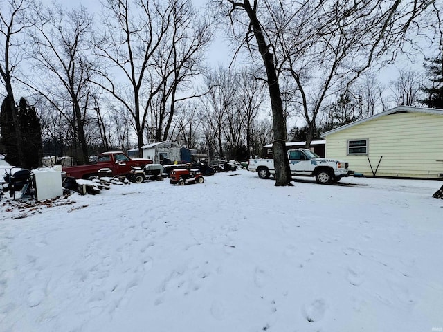 view of yard covered in snow