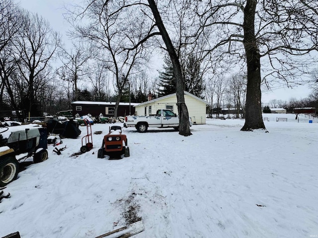 view of yard layered in snow