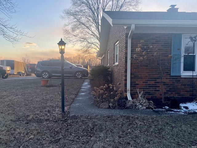 view of property exterior at dusk