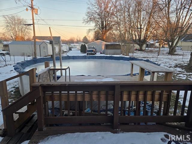 view of snow covered deck