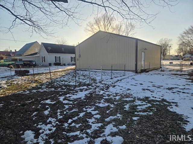 view of snow covered property