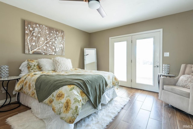 bedroom featuring ceiling fan, access to outside, and light wood-type flooring