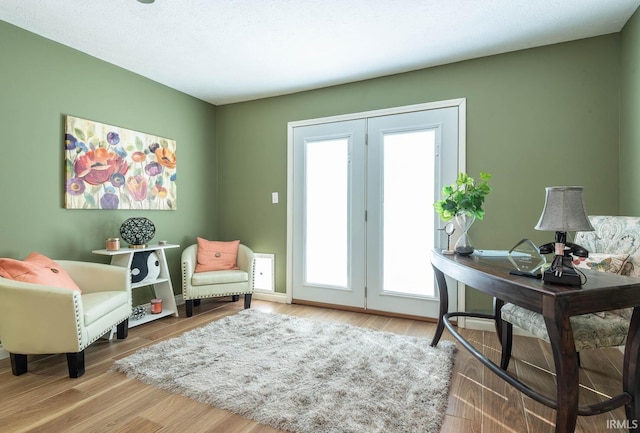 living area featuring hardwood / wood-style floors