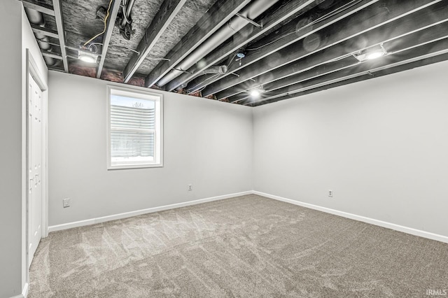 basement with carpet flooring