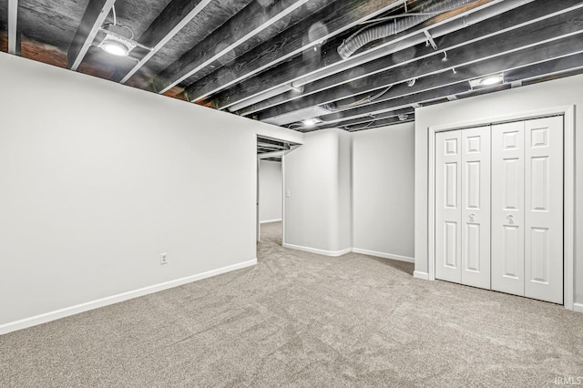 basement with carpet flooring