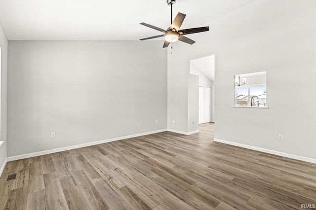 unfurnished living room featuring lofted ceiling, ceiling fan, and hardwood / wood-style floors