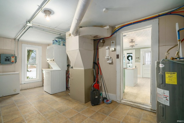 basement with electric panel, water heater, heating unit, and fridge