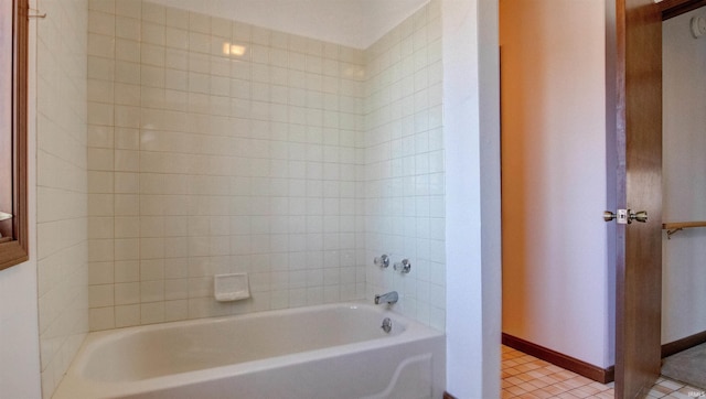 bathroom with tile patterned floors