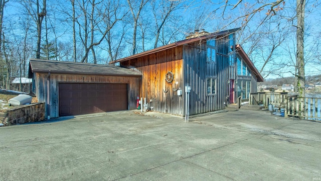 view of property exterior featuring a garage