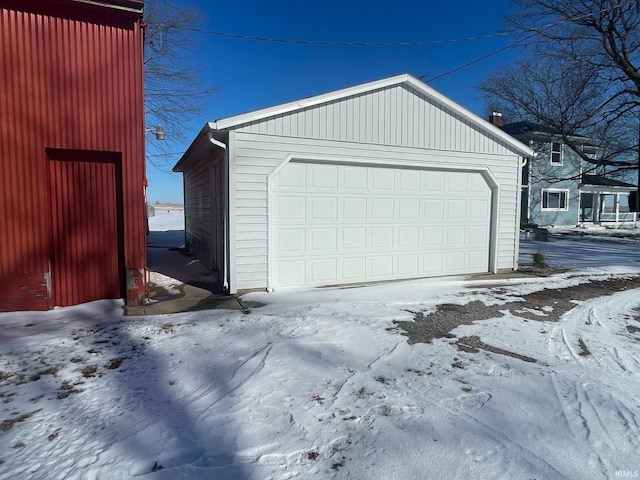 view of snow covered garage