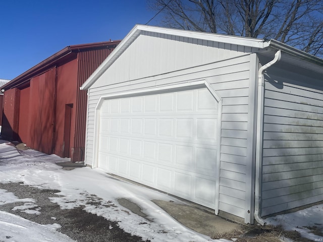 view of snow covered garage