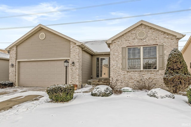 ranch-style house featuring a garage