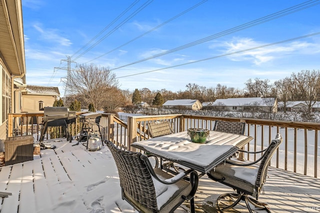 view of snow covered deck