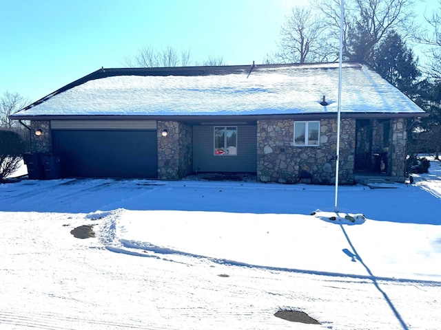 single story home featuring a garage