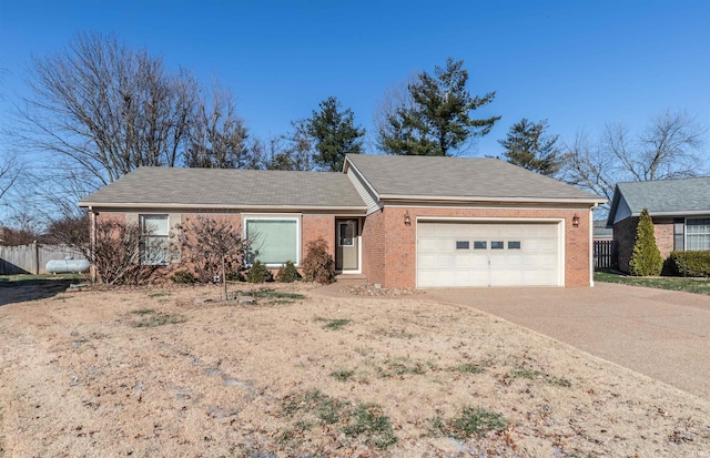 single story home with a garage