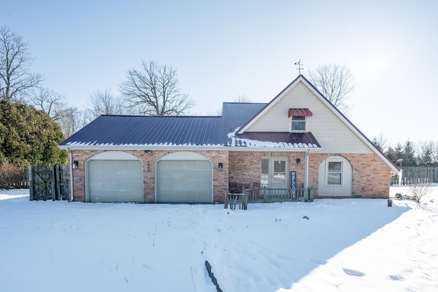 view of front of property featuring a garage