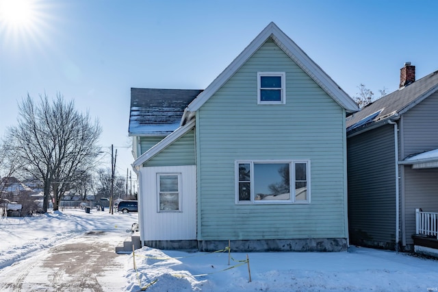 view of snow covered property