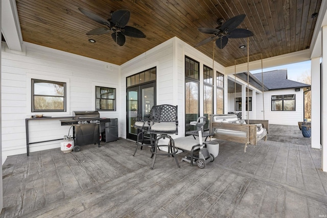 view of patio featuring ceiling fan