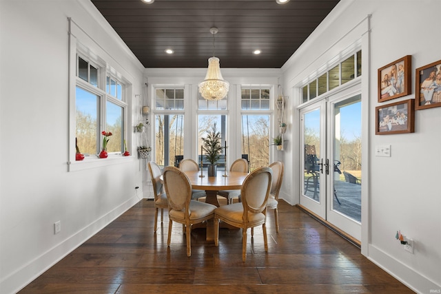 dining room featuring wood ceiling, dark wood-type flooring, and french doors