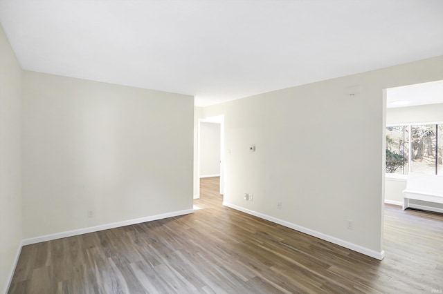 empty room featuring hardwood / wood-style floors