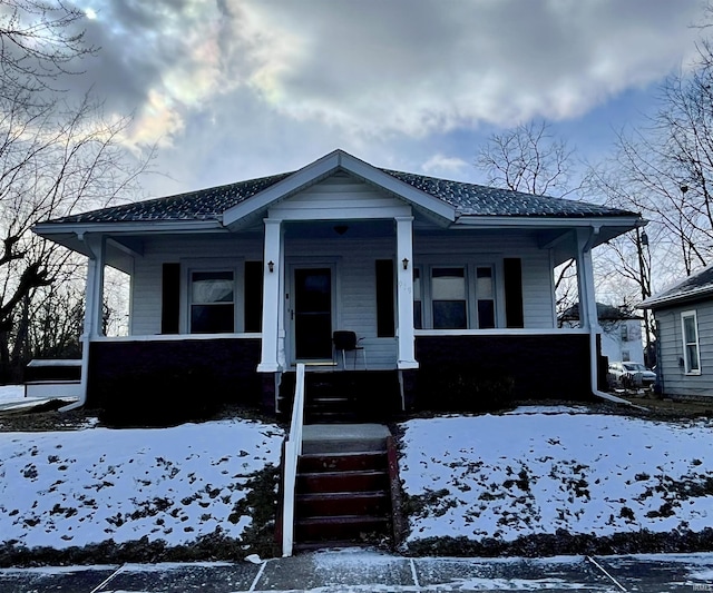 bungalow featuring a porch