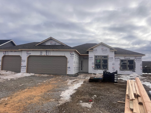 property under construction featuring a garage