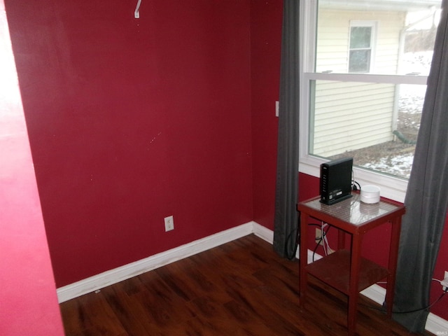 interior space with dark hardwood / wood-style flooring