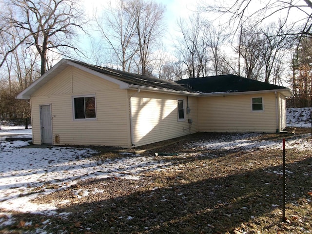 view of snow covered property