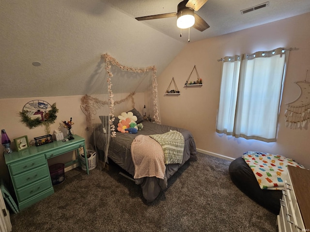 carpeted bedroom with lofted ceiling, ceiling fan, and a textured ceiling