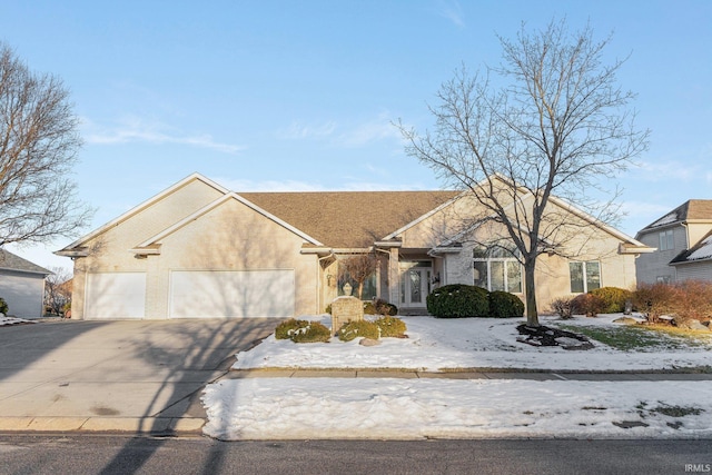 ranch-style home featuring a garage