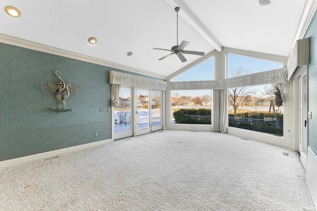 unfurnished sunroom with ceiling fan and vaulted ceiling with beams