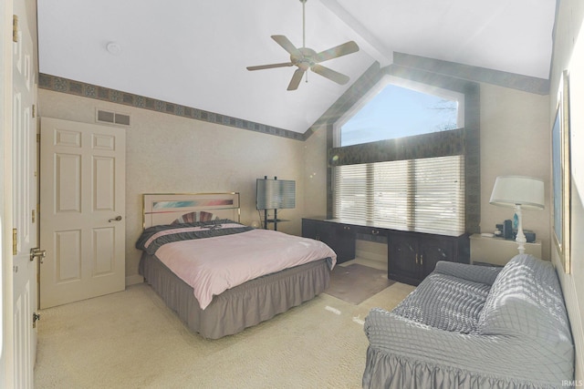 bedroom with vaulted ceiling, ceiling fan, and light carpet