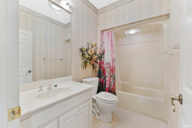 full bathroom featuring toilet, vanity, and shower / bathtub combination with curtain