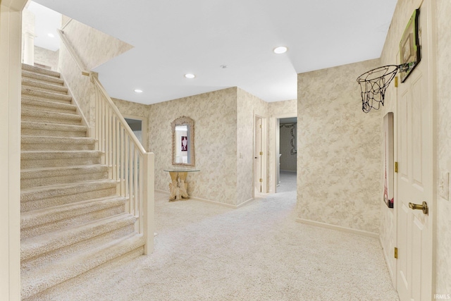 interior space featuring light colored carpet