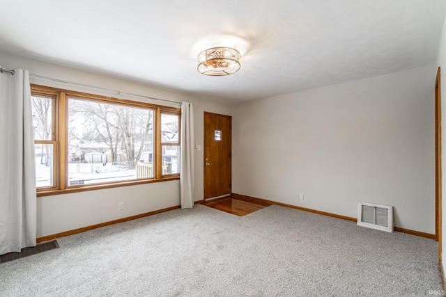 view of carpeted spare room