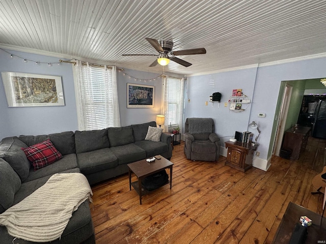 living room featuring ceiling fan, wooden ceiling, ornamental molding, and hardwood / wood-style flooring