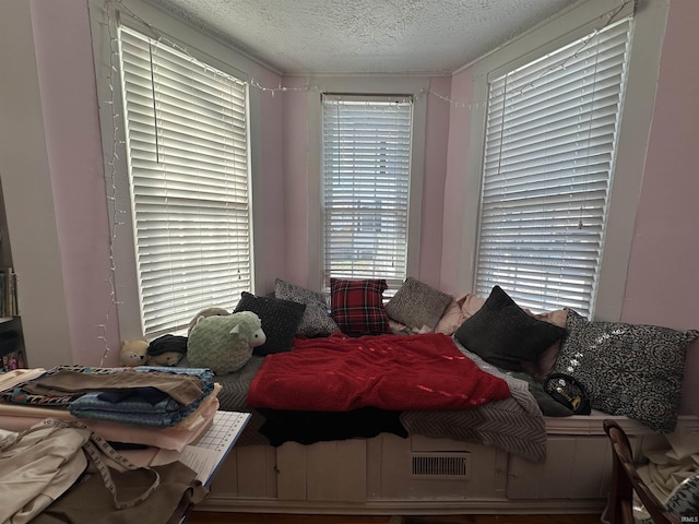 bedroom featuring a textured ceiling