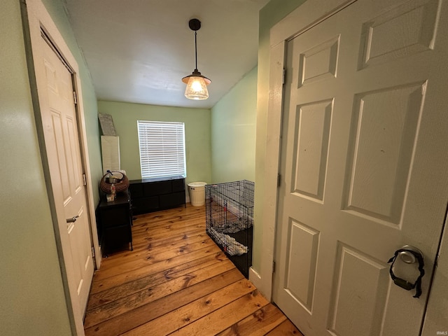 corridor with light wood-type flooring