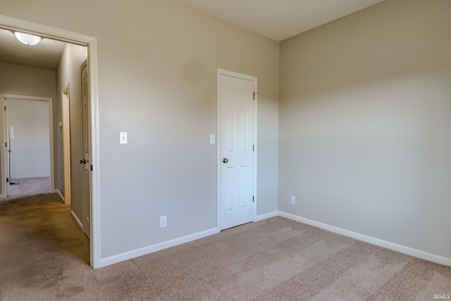 unfurnished bedroom featuring carpet floors