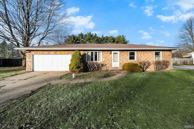 single story home with a front lawn and a garage