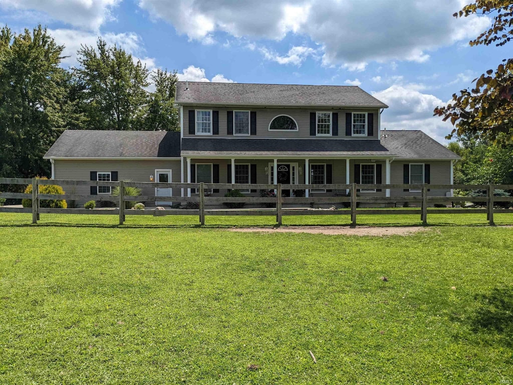 view of front of property with a front lawn