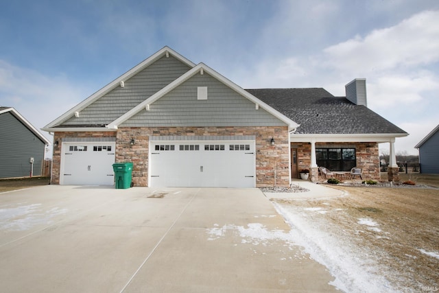 craftsman inspired home with a garage