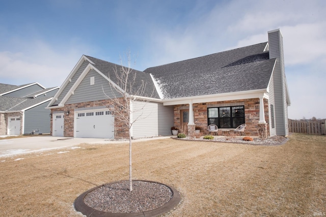 craftsman-style home with a garage