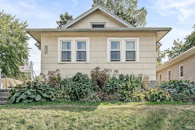 view of property exterior featuring a yard