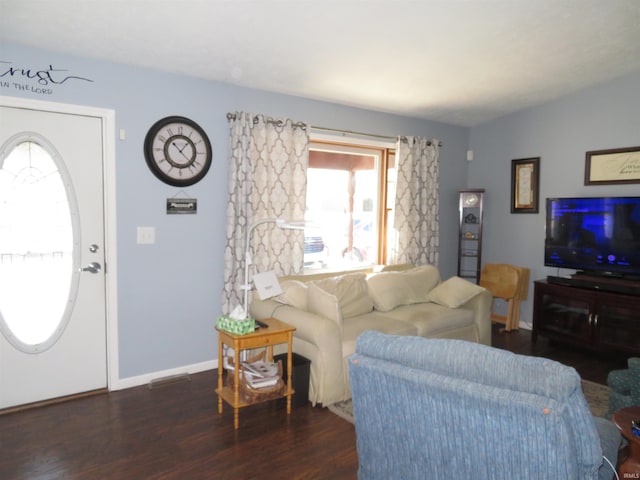 living room featuring dark hardwood / wood-style floors