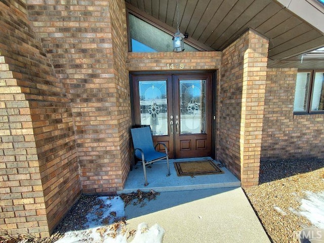 doorway to property featuring french doors