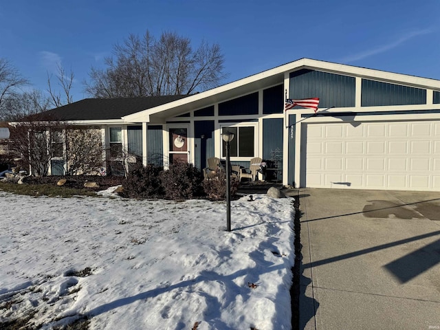 single story home featuring a garage