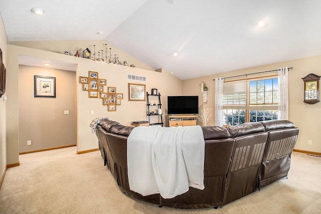 living room with light carpet and vaulted ceiling