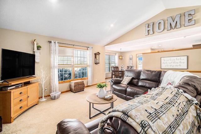 living room featuring vaulted ceiling and light carpet